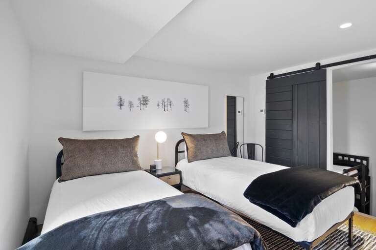 This spacious Guest Room shares and ensuite with the bunk area and upon request can be converted to a king bed.