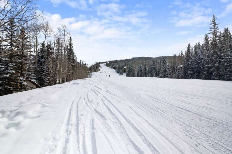 Sundance blue run ski-in/ski-out straight to the back deck of the house.
