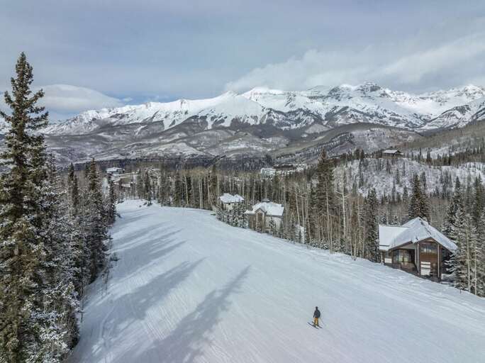 Sundance Literally runs right next to the House.  This blue run can be accessed off Lift 10.