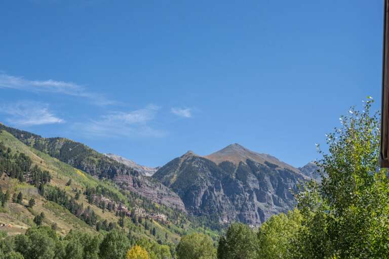 This three-bedroom condo offers stunning mountain views and a prime central location in downtown Telluride.