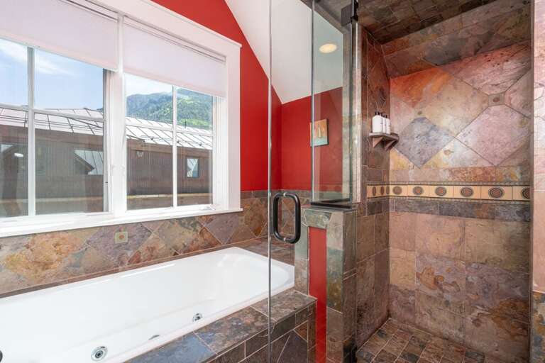 Enjoy a soak after a big day with incredible view of Ballard Mountain.