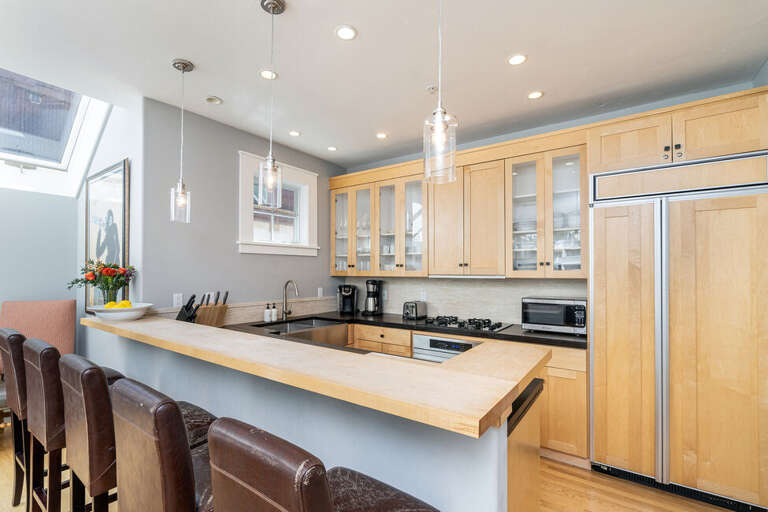 Open concept kitchen with modern appliances. Open concept kitchen with modern appliances.