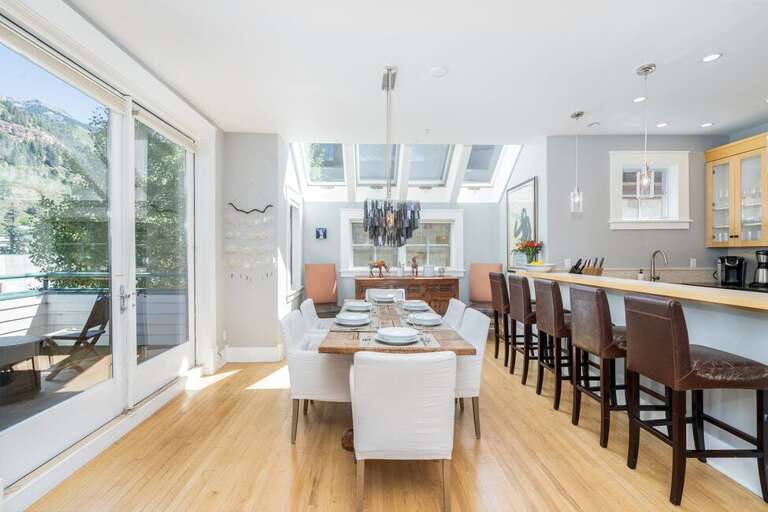 Open dining space that seats 6 on second level.