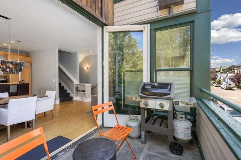 Private deck off dining area with grill.