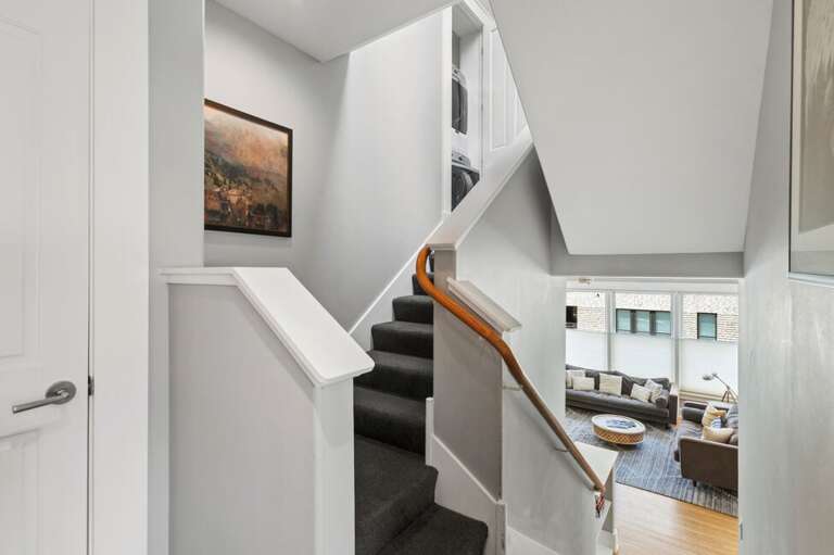 Stairway from living room to bedrooms.