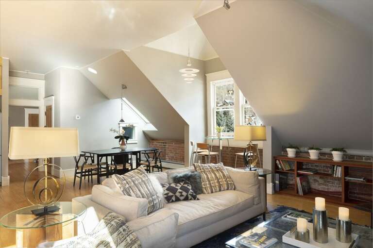 Cozy open living space with ample couch areato relax, read a book, catch a movie or take a snooze after a long day in the mountains.