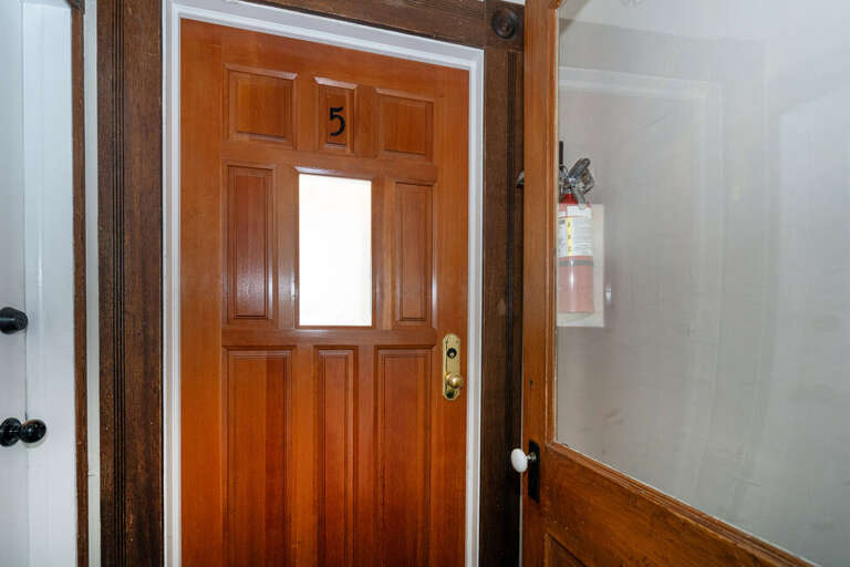 Front door to the third story unit.