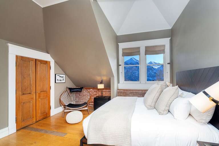 The primary suite features King bed, spacious walk-in closet, ensuite bathroom.