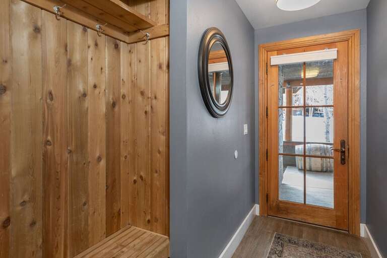 Great entryway into the unit from the front porch, with plenty of hooks to hang your jackets and store your shoes.  The garage can be accessed via the front entry way as well.