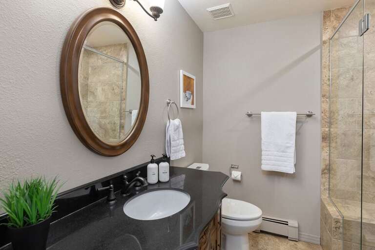 The shared bathroom for Guest room one and two features a large single Sink vanity and spacious towel closet. The shared bathroom for Guest room one and two features a large single Sink vanity and spacious towel closet.
