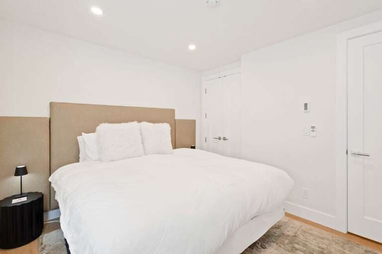 This guest room features a versatile king bed that can be converted into two twin beds upon request.