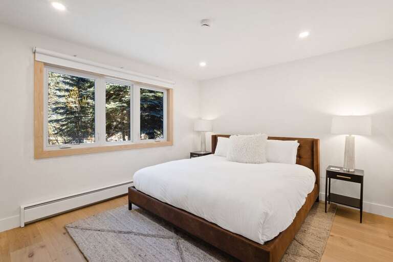 The Primary bedroom features king bed and ensuite bathroom.