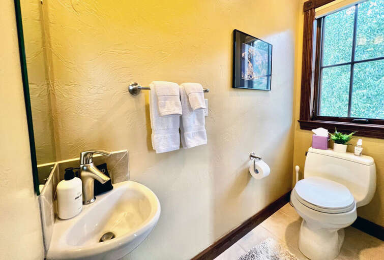 Half bath off the Kitchen and Living area.