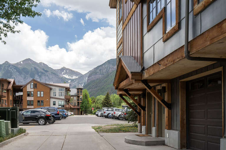 Located on the West end of town there is ample first come first serve parking located near the unit.  Steps away from the free Bus service as well as the local grocery.