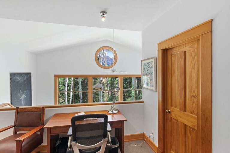 Need to get a bit of work done? This spacious home features a working area for just that. Need to get a bit of work done? This spacious home features a working area for just that.