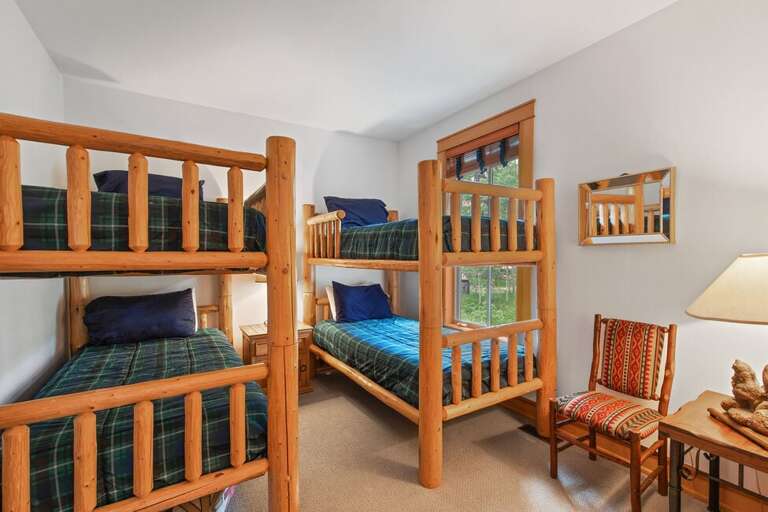 The Bunk room features four single beds.