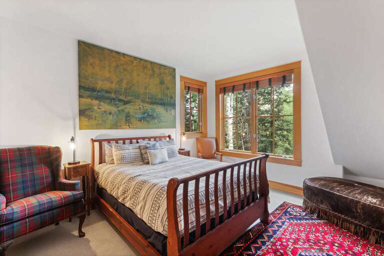 The First floor Guest Room features a Queen size bed, amazing views of the mountains and plenty of cozy space.