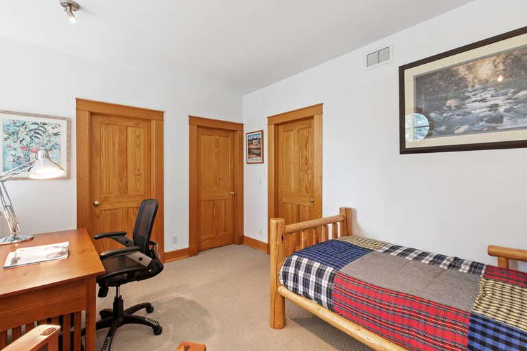 The second floor landing leads to the two top bedrooms as well as a shared full bathroom.