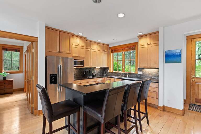 A gourmet Kitchen with plenty of counter space and breakfast bar seating for 4. A gourmet Kitchen with plenty of counter space and breakfast bar seating for 4.