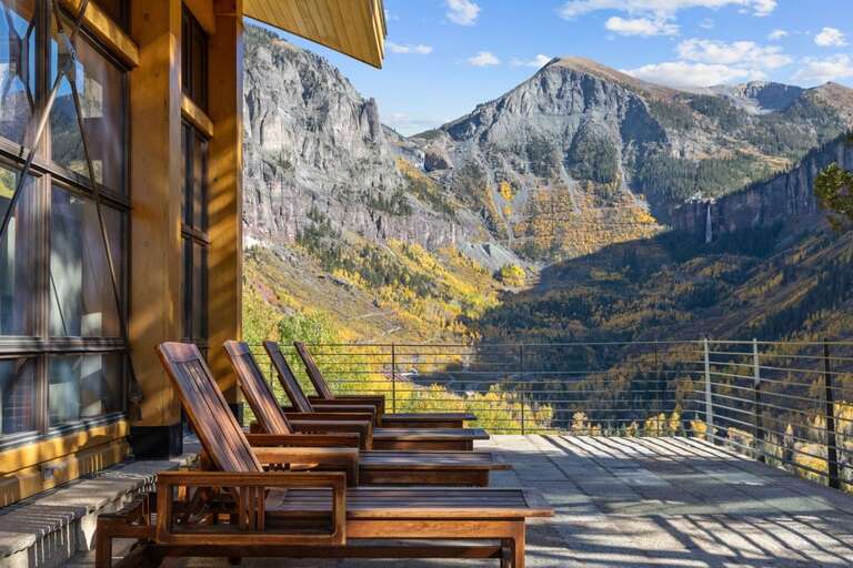 Huge porch space surrounds this stunning home on all levels.