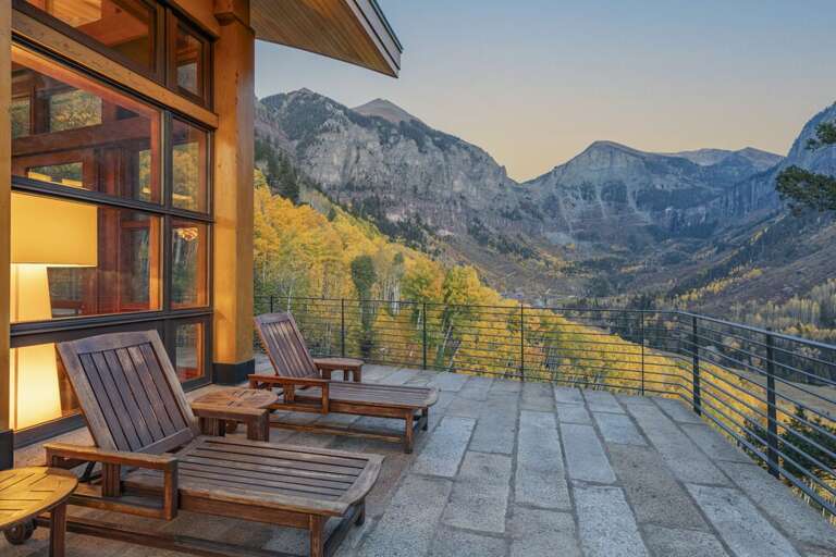 Huge porch space surrounds this stunning home on all levels.