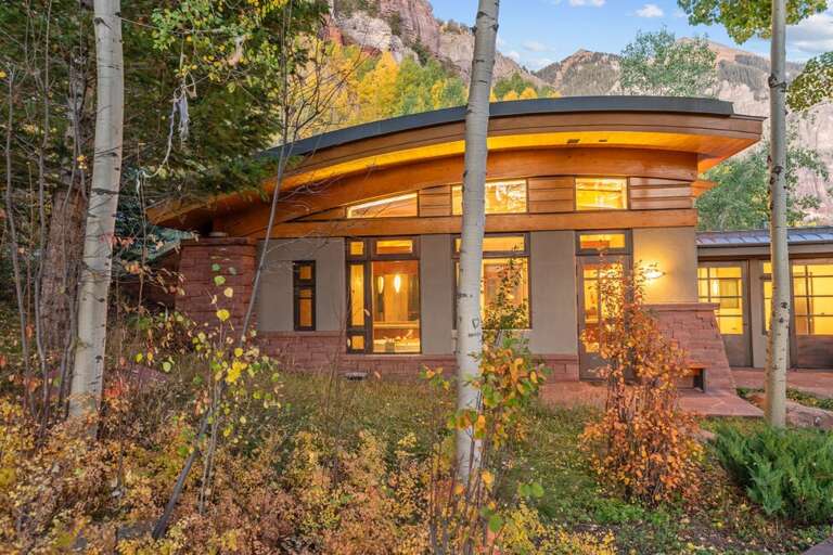 This spectacular luxury private home in Telluride with mountain, waterfall views from all windows and decks.