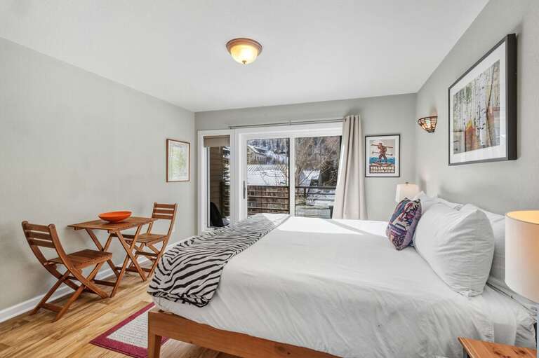 This beautiful Room opens up to a private deck overlooking the San Miguel River.