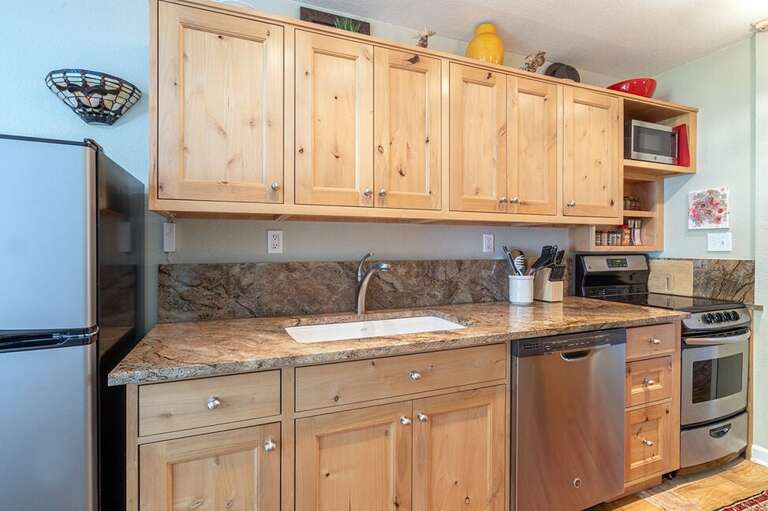 Galley Kitchen with all you needs for a perfect family vacation.