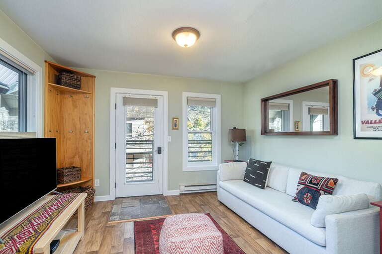 This living room couch pulls out to a double bed for extra room. This living room couch pulls out to a double bed for extra room.