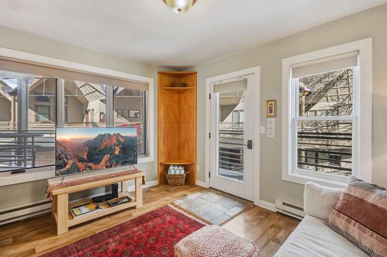 Perfect living area with flat screen television.