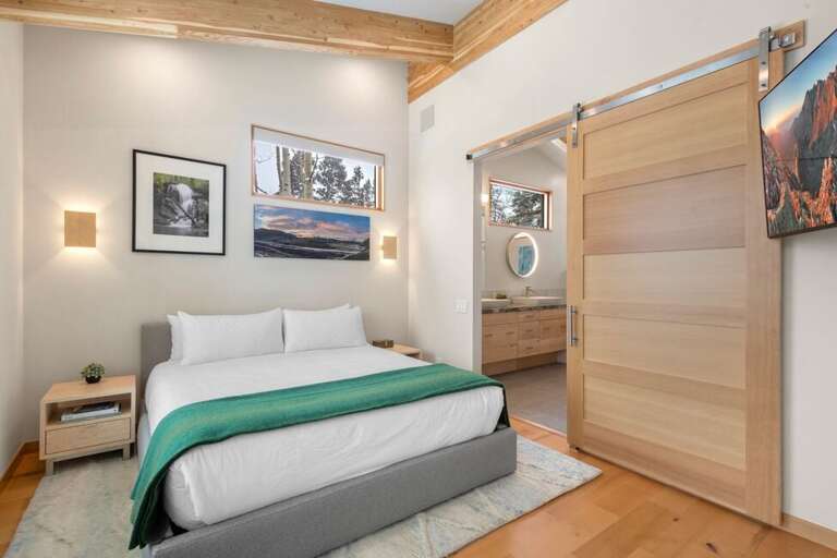 California King/cozy couch area and work desk located on the top level of this multi-level home