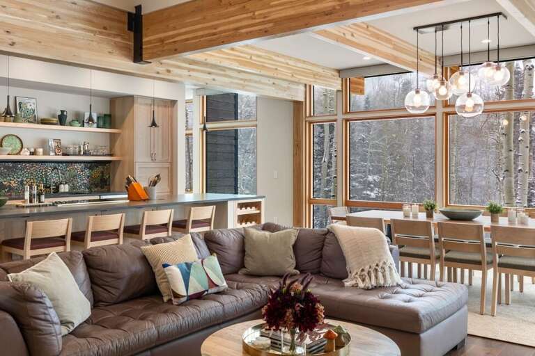 Floor to ceiling windows in Dining/living area offers views of the beautiful Aspen grove surrounding the home. Floor to ceiling windows in Dining/living area offers views of the beautiful Aspen grove surrounding the home.