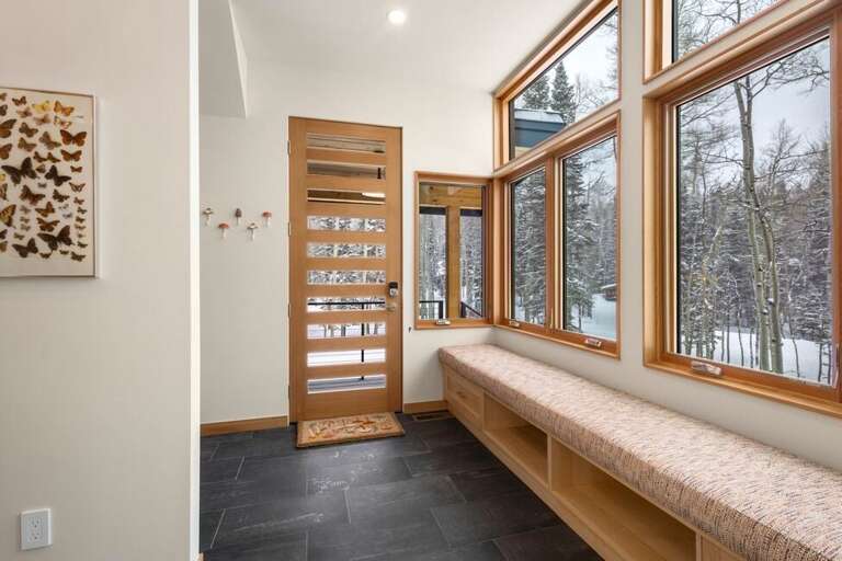 Formal Entrance located allows guests to enter into the dining/kitchen level. Ample space for shoes and jackets. Formal Entrance located allows guests to enter into the dining/kitchen level. Ample space for shoes and jackets.
