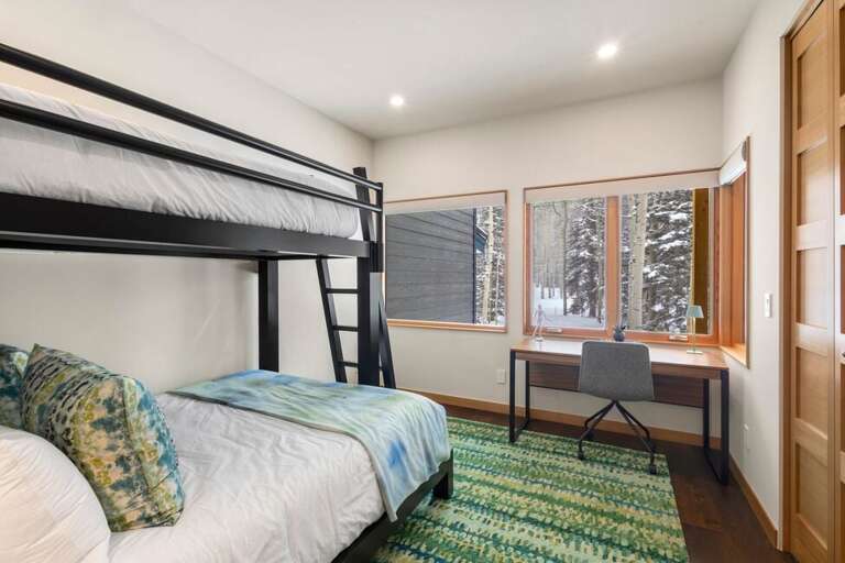 The First level of Saddle Horn Lane features 2 additional guest rooms both with desk area , huge closet and Captain's bunks. The First level of Saddle Horn Lane features 2 additional guest rooms both with desk area , huge closet and Captain's bunks.