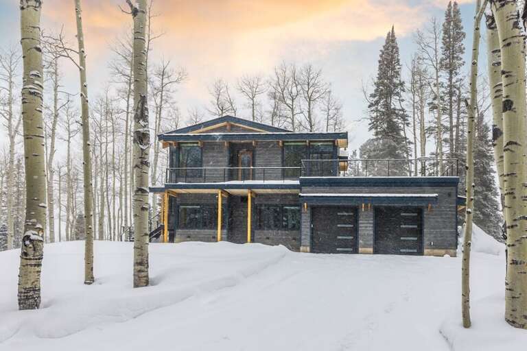 Luxury home away from home with stunning views, modern amenities, hot tub, multi-level deck areas laundry room and located in the quiet neighborhood above Telluride.