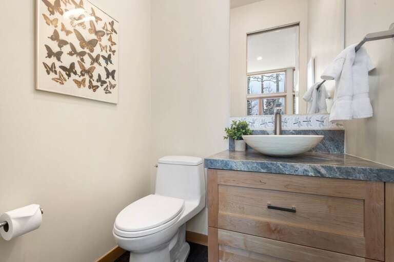 Powder bathroom located on living/dining level.