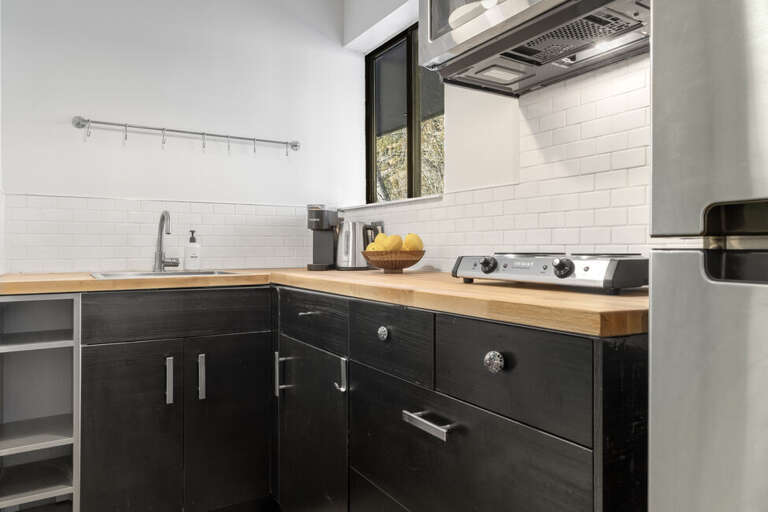 Spacious Galley Kitchen with all your basic cooking needs.