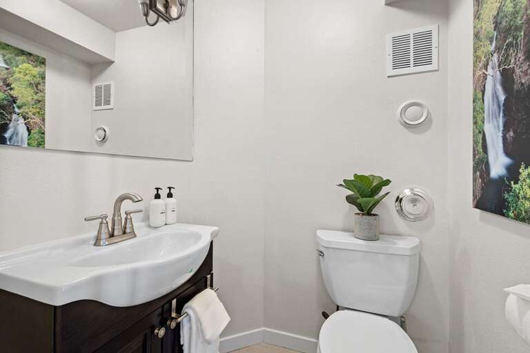 This level also features a half-bath.