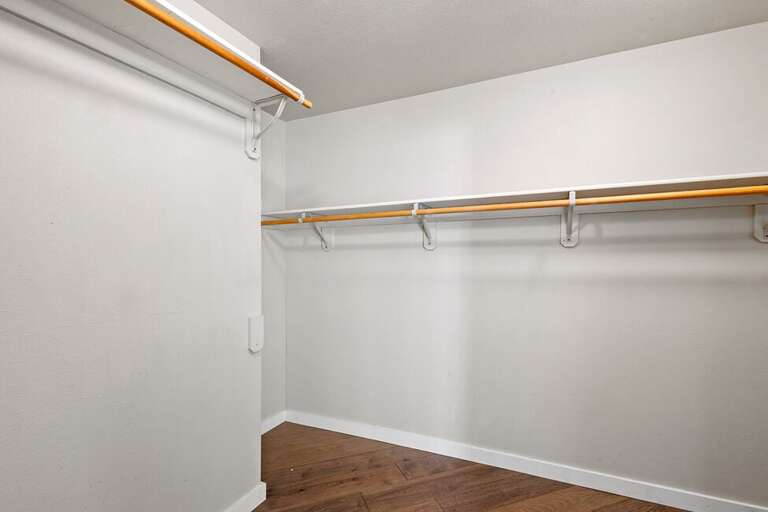 Primary suite features huge walk -in closet