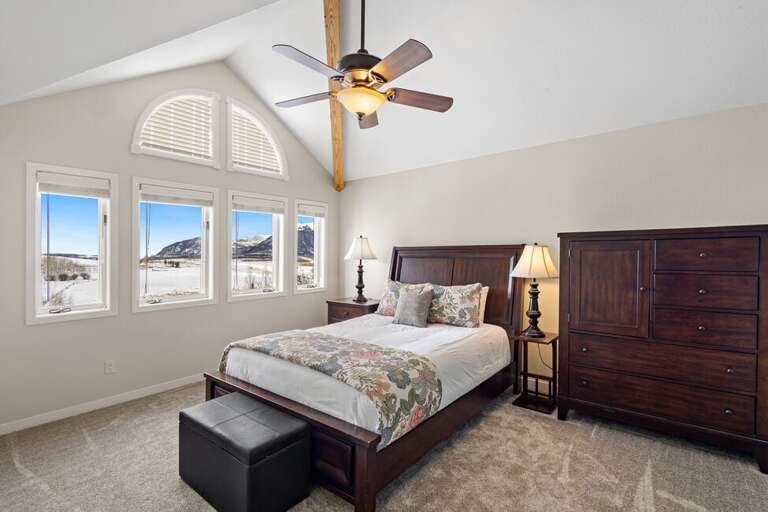 Spacious Guest room with Queen bed and stunning views.