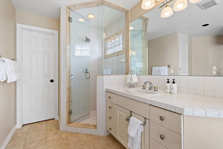 Step in shower and water closet.