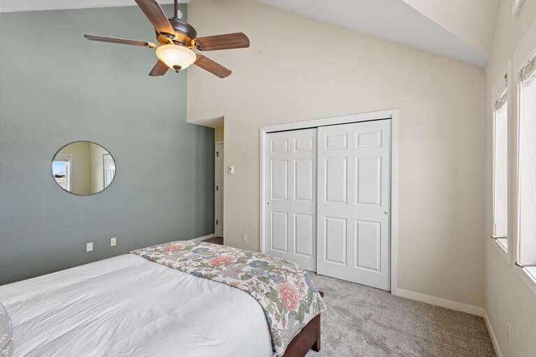 On the top level of this home is also a Queen size guest bedroom.