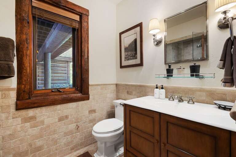 Guest room ensuite bathroom with step in shower.