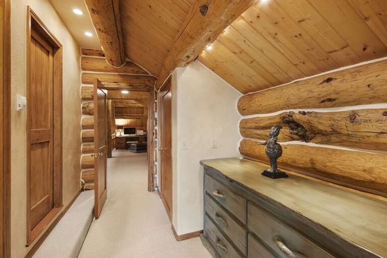 Down the hall is the Primary suite bathroom with ample storage for clothing and gear and features a separate water closet.