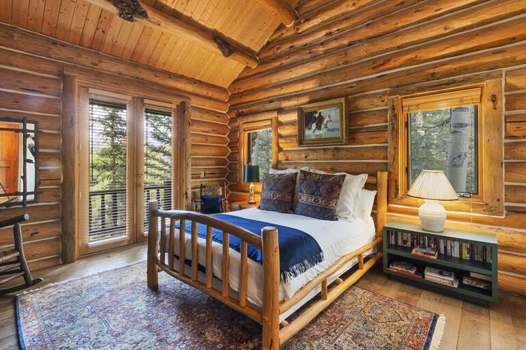 Main level guest room with Queen bed, located off the Great room.