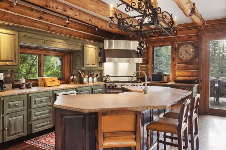 Modern Kitchen with a log cabin vibe.