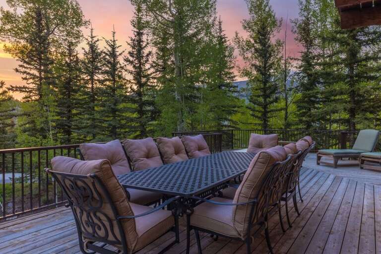 The outdoor dining is spacious and offers stunning views of the surrounding mountains.