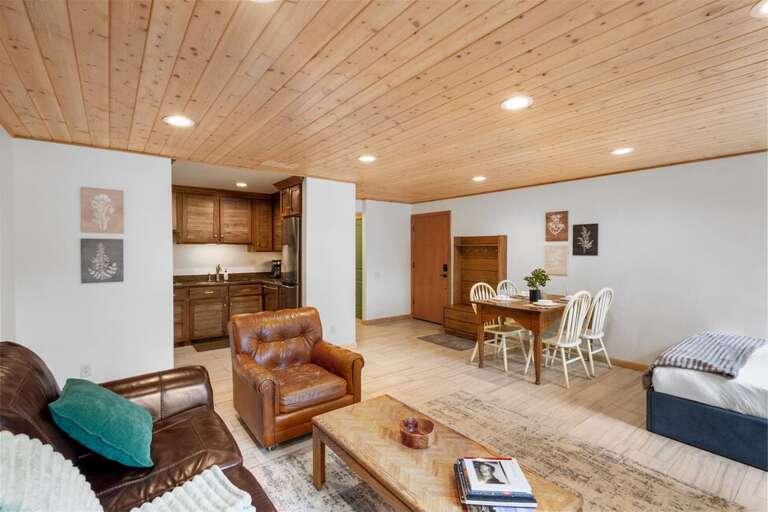 Spacious and open living/dining/sleeping area with full kitchen and full bathroom.