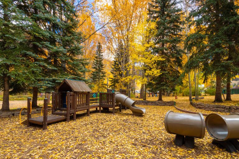 Nearby playgrounds and open spaces make this a perfect family destination.
