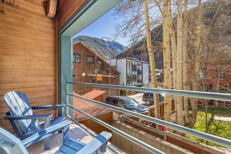 Private deck off the living area with views of the surrounding area.